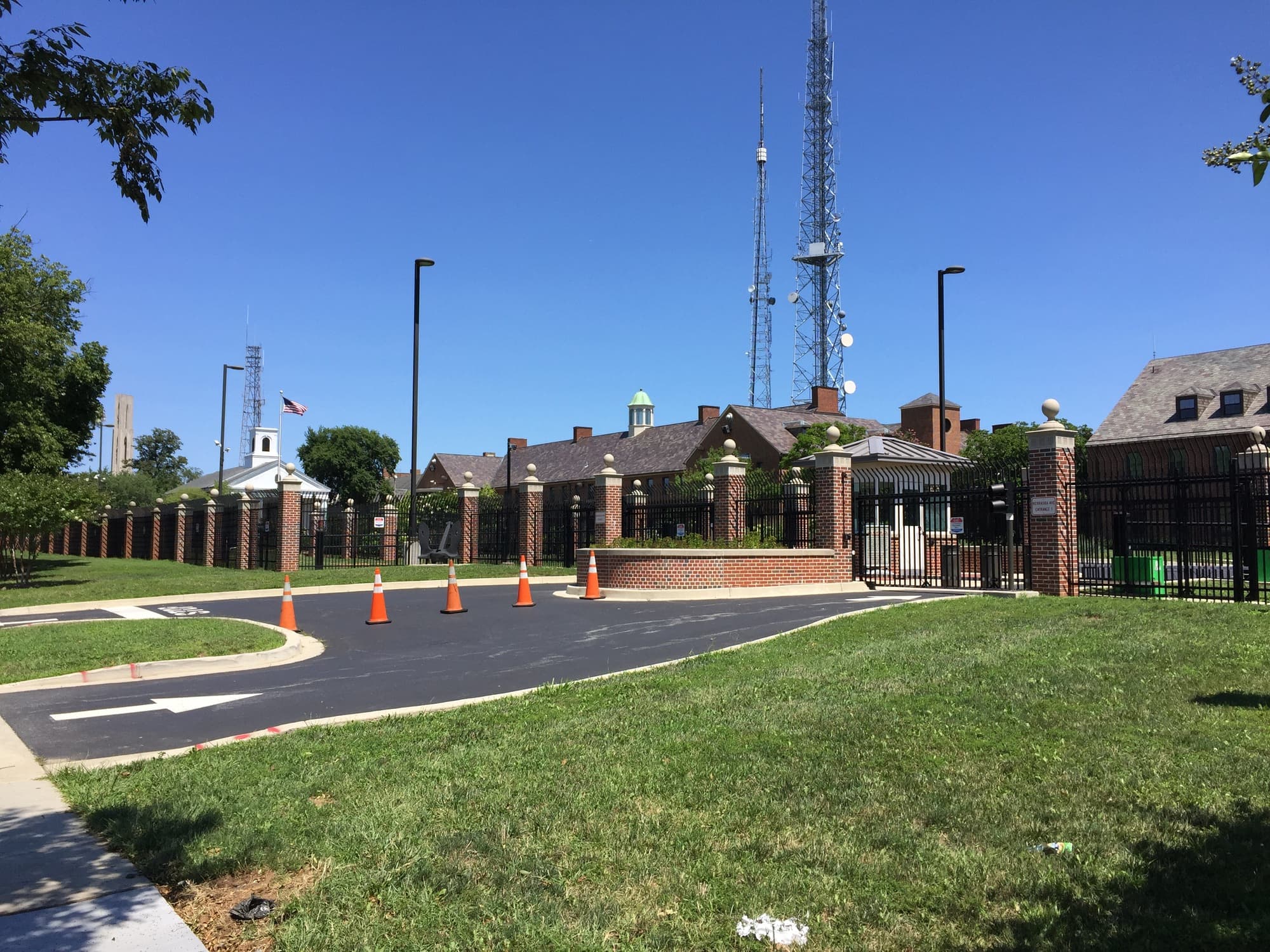 A secured entrance and brick buildings at the Nebraska Avenue Complex in Washington, D.C., photographed in 2017.