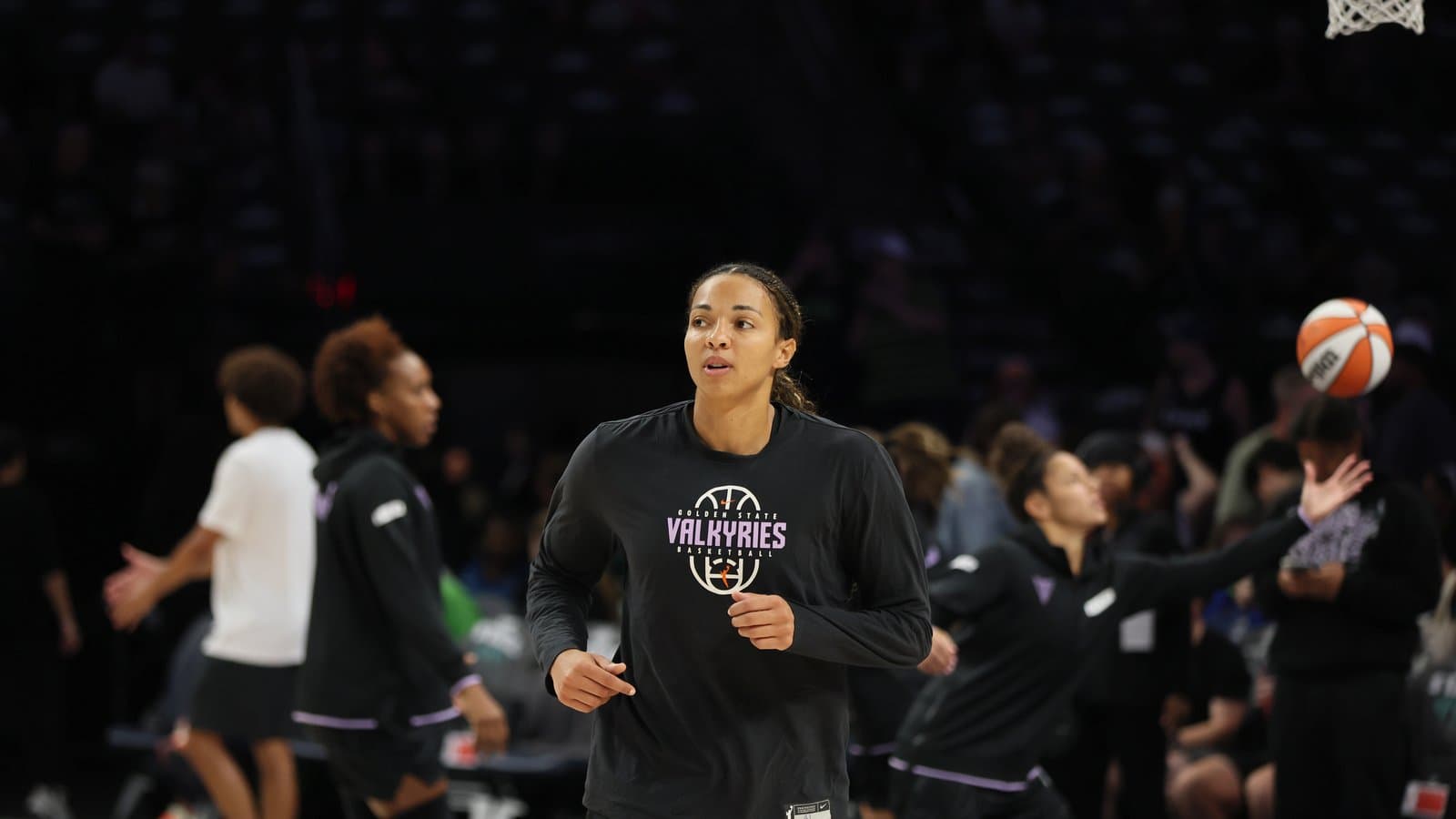 ARCHIVE PHOTO: Golden State Valkyries center Kiah Stokes, in a black Valkyries warm-up shirt, jogs on the court before a game.