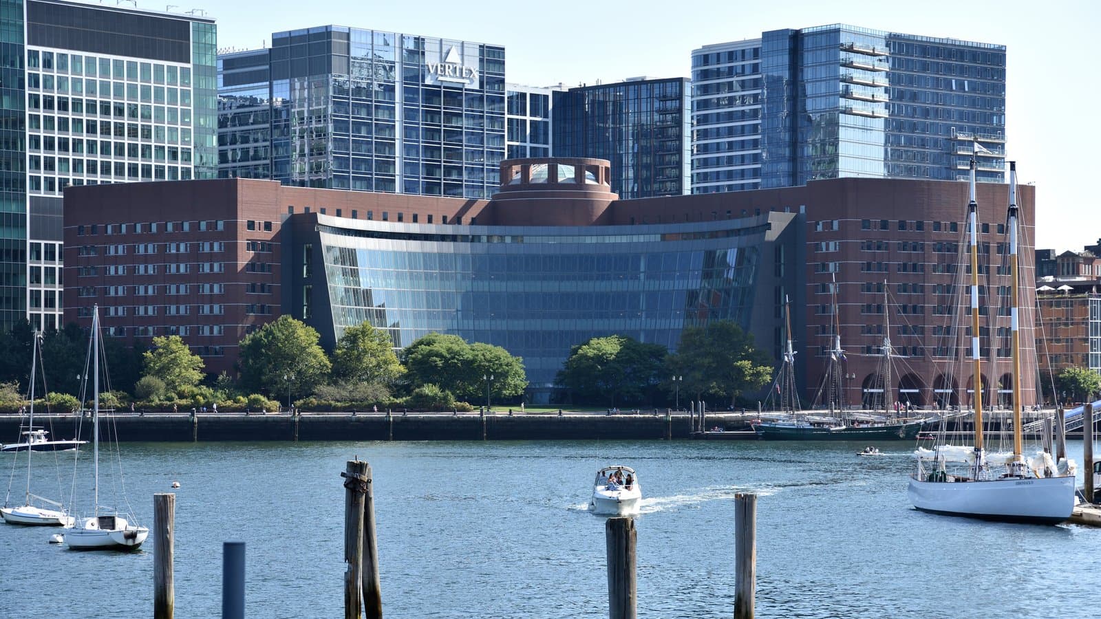 ARCHIVE PHOTO: The brick-and-glass John Joseph Moakley U.S. Courthouse on Boston Harbor on a clear day.